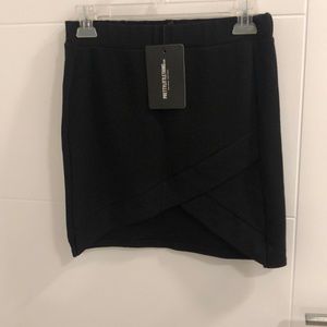 Pretty little things asymmetrical mini skirt